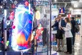 Visitors in front of an innovation booth