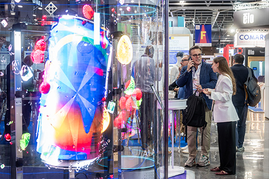 Visitors in front of an innovation booth